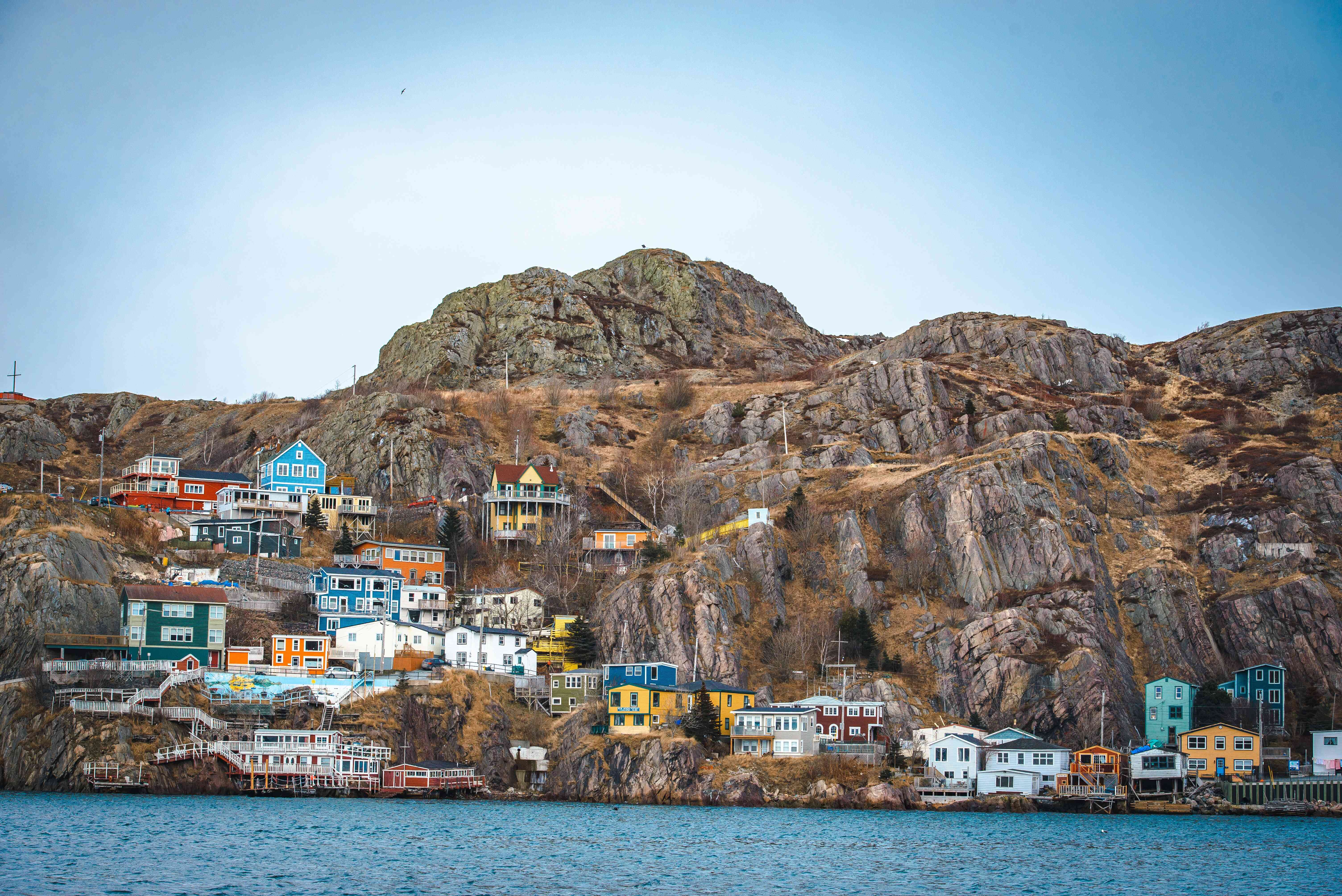 Houses located on the water and at the bottom of a hill